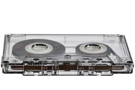 Сlose up of vintage audio cassette, isolated on white background