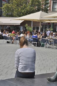 AACHEN,GERMANY- JULY 26, 2014:Woman and pavement cafes in Aachen