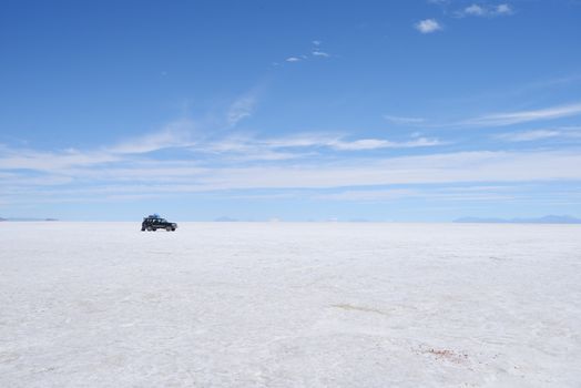 a surreal landscape of infinite view of salt flat in uyuni, bolivia