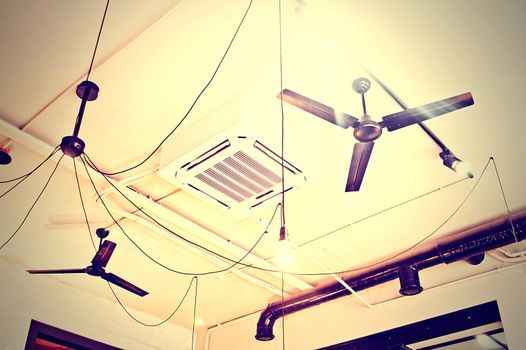 Interior conceptual image. Ceiling with ventilators and air conditioning.