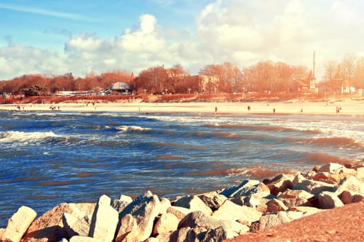 Sea and ocean conceptual image. Coast with beach and blue sunny sky.