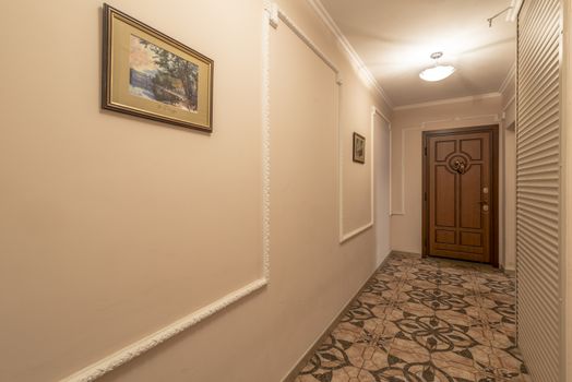 entrance of a residential building with an elevator