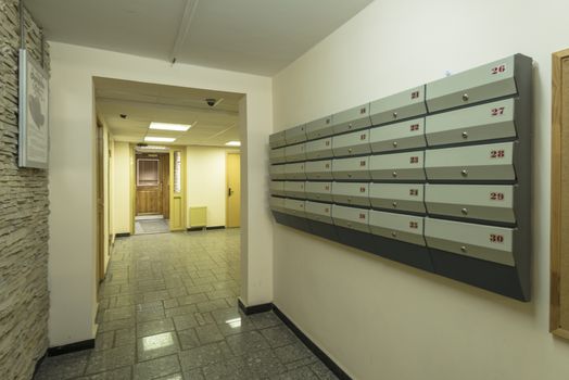 entrance of a residential building with an elevator