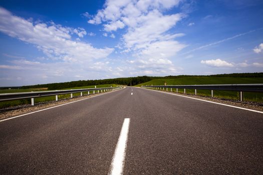  the road asphalted. summertime of year. Belarus