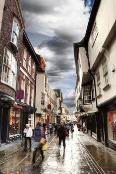 Rainy english weather on old streets of York.