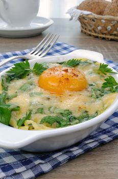 baked spinach and cheese with egg yolk