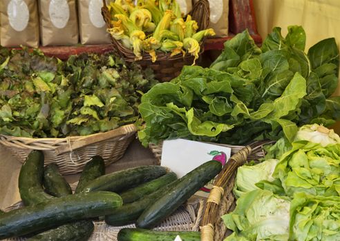 Fresh organic vegetables in wicker basket in the market