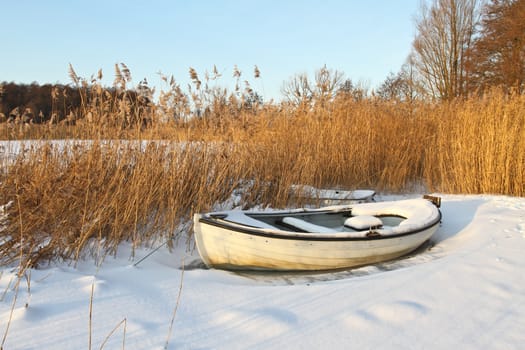 Boats at the lake in winter in Denmark