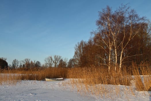 Boats at the lake in winter in Denmark
