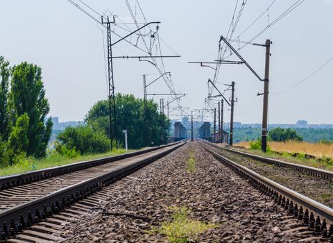 rails stretching into the distance on the bridge