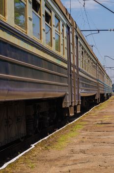 the electric train arrives at the station