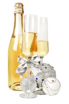 Champagne sparkling wine and new year silver glitter balls composition