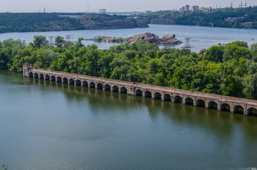 bridge hydroelectric plant on blue sky background