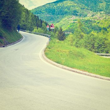 Winding Asphalt Road in the Italian Alps, Instagram Effect