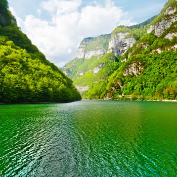 Green Water of the Mountain Lake  in the Italian Dolomites