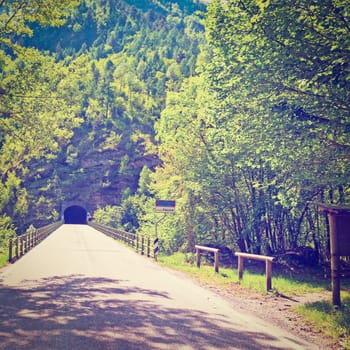 Tunnel in the Rock on the Road of Italian Dolomites, Instagram Effect