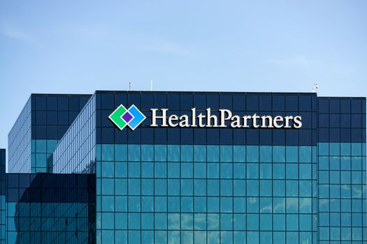 BLOOMINGTON, MN/USA - August 12, 2015: HealthPartners headquarters building. HealthPartners is an integrated, nonprofit health care provider.