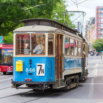 Stockholm, Sweden - June 7, 2015: Traditional retro blue tram in Stockholm conecting Gamla stan and Djurgardenon on June 7, 2015.