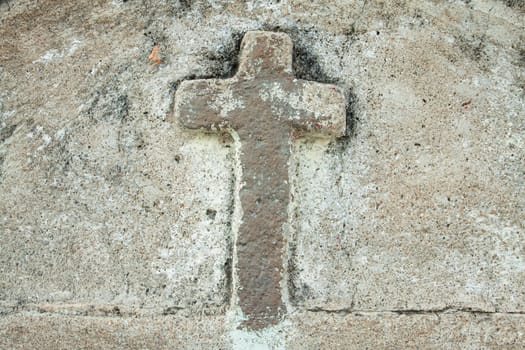 cross on old wall background texture.jpg