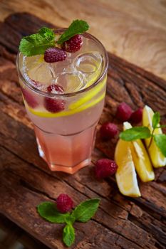 Refreshing homemade lemonade with raspberries and french mint