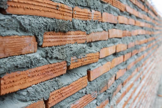 Close up of brick wall ending in infinity