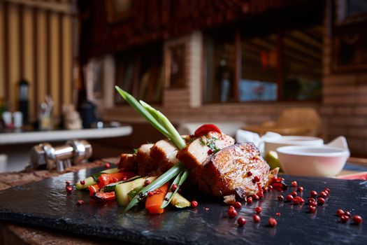 Roasted pork with grill vegetables with copy space