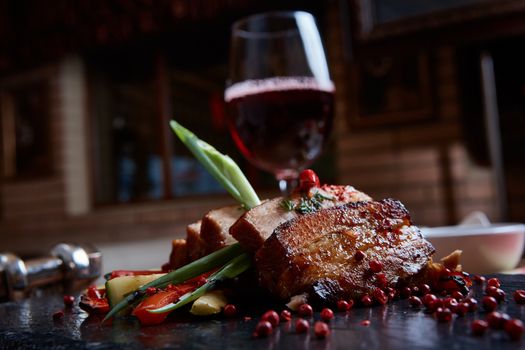 Roasted pork with grill vegetables with copy space