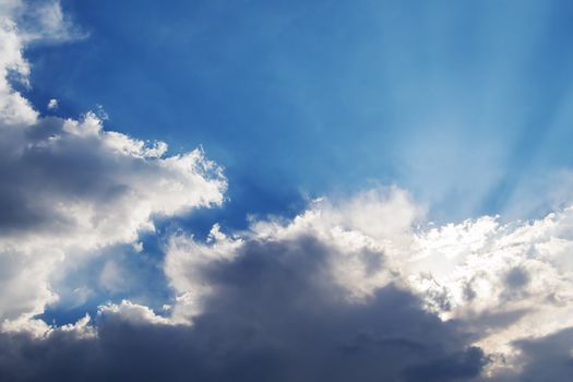 Stormy clouds over lanscape at sunset