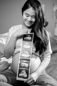 Asian pregnant women showing untrasond pictures