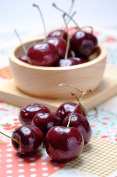 cherry in wooden bowl