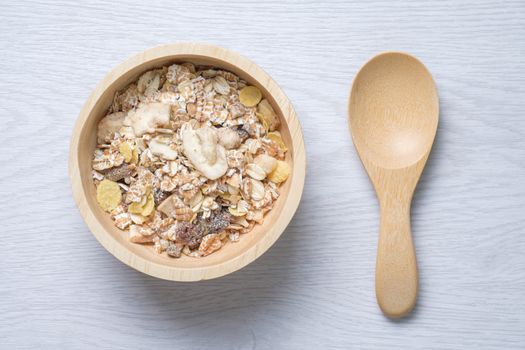 muesli in wooden bowl. healthy food for health, weight loss, diet