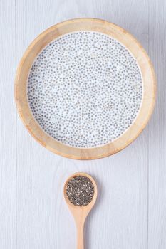 chai seed with milk on the white wooden table