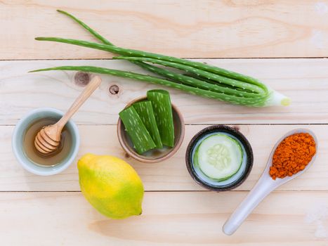 Natural Spa Ingredients homemade facial masks and natural ingredients for skin care on wooden table.