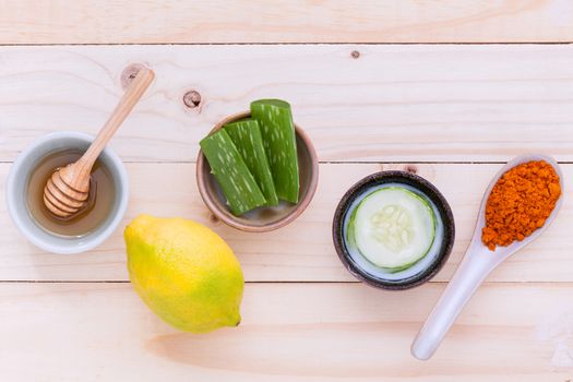 Natural Spa Ingredients homemade facial masks and natural ingredients for skin care on wooden table.