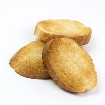 Crispy toasts isolated on white background