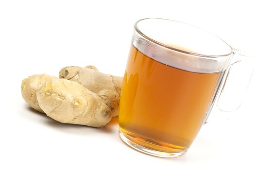 Cup of black tea served with ginger isolated on white