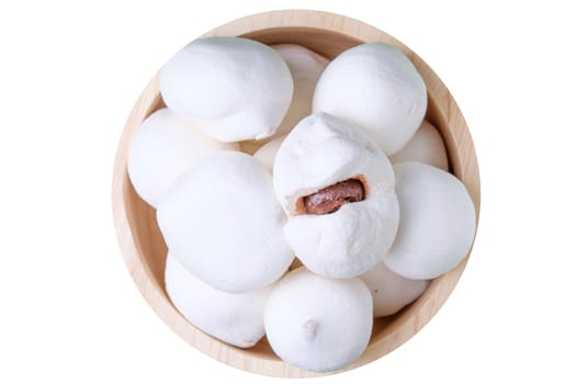 Marshmallows in wooden bowl, isolate white background
