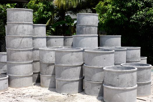 Stock of cement pipe at outdoor warehouse