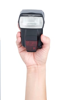 hand holding speedlight flash isolate on white background