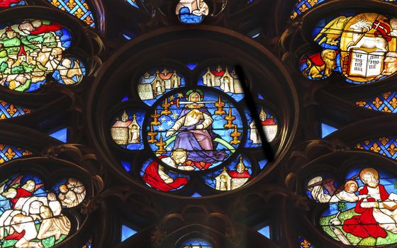 Jesus Christ With Sword Rose Window Stained Glass Saint Chapelle Paris France.  Saint King Louis 9th created Sainte Chappel in 1248 to house Christian relics, including Christ's Crown of Thorns.  Stained Glass created in the 13th Century and shows various biblical stories along wtih stories from 1200s.