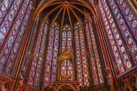 Stained Glass Saint Chapelle Cathedral Paris France.  Saint King Louis 9th created Sainte Chappel in 1248 to house Christian relics, including Christ's Crown of Thorns.  Stained Glass created in the 13th Century and shows various biblical stories along wtih stories from 1200s.