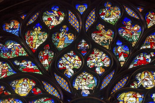 King and Court Advisors Angels Horses Rose Window Stained Glass Saint Chapelle Paris France.  Saint King Louis 9th created Sainte Chappel in 1248 to house Christian relics, including Christ's Crown of Thorns.  Stained Glass created in the 13th Century and shows various biblical stories along wtih stories from 1200s.