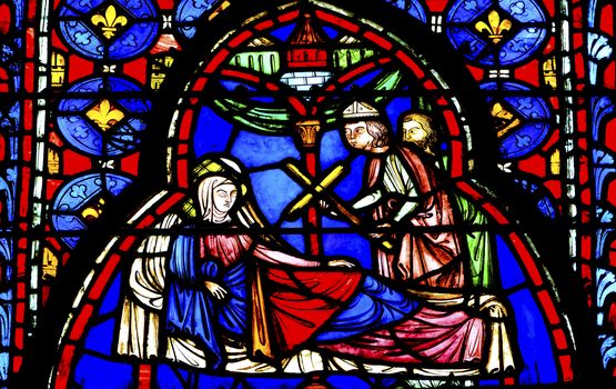 Queen Entering Jerusalem Medieval Life Stained Glass Saint Chapelle Paris France.  Saint King Louis 9th created Sainte Chapelle in 1248 to house Christian relics, including Christ's Crown of Thorns.  Stained Glass created in the 13th Century and shows various biblical stories along with stories from 1200s.