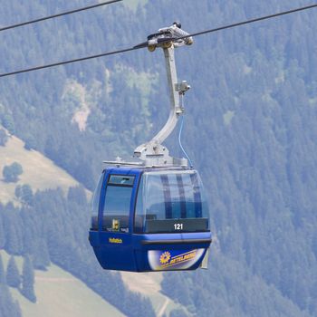 Lenk im Simmental, Switzerland - July 12, 2015: Ski lift in mountain during the summer. The village is located in the canton Bern, Lenk, August 12, 2015