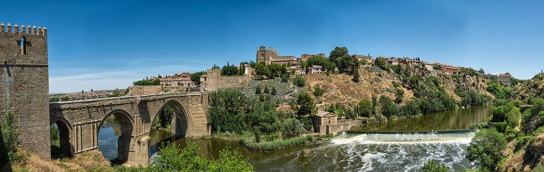 Panorama Toledo, bridge San Martin and river Tagus.