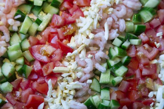 Sandwich layer cake Topping consisting of cucumber, eggs, and tomato.