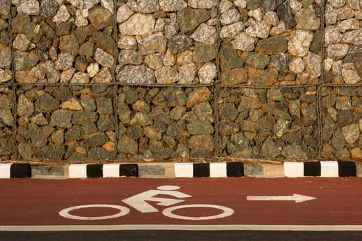 Bicycle road sign and arrow in outdoors