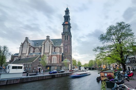 Amsterdam, Netherlands - May 7, 2015: People at Westerkerk (Western Church) a Dutch Protestant church in central Amsterdam in the Netherlands. on May 7, 2015.