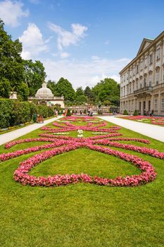 Salzburg, Austria - June 15, 2014: Beautiful arranged flowers at Mirabell Garden, a famous tourist destination