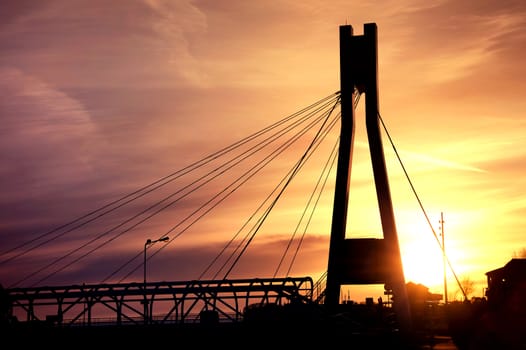 Architecture. Bridge construction against evening sky and sundown.